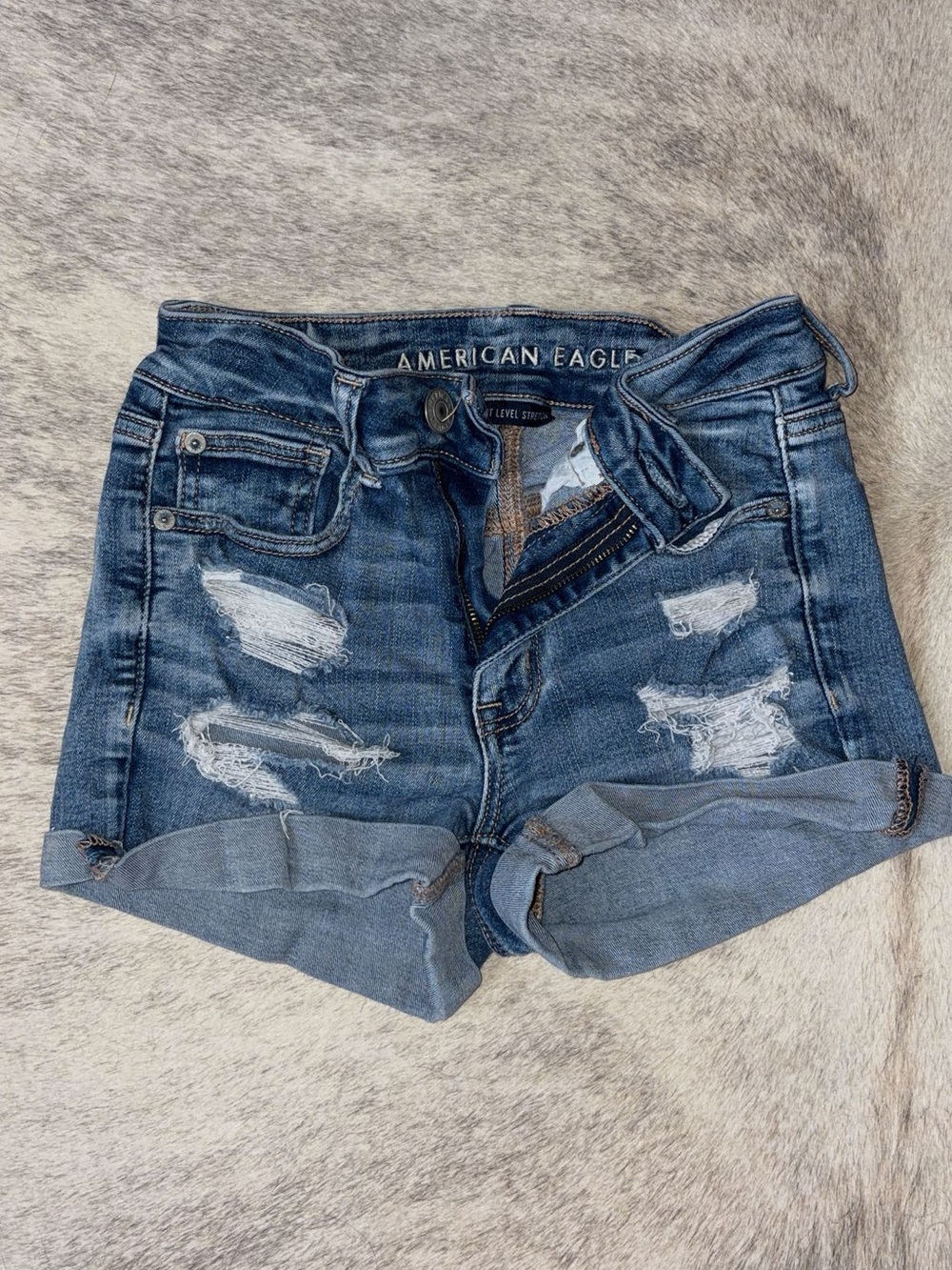 American Eagle Outfitters Ripped Roll-Cuff Denim Shorts - Blue